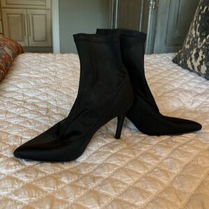 Black Women's Heeled sock boots.  Boots size 11